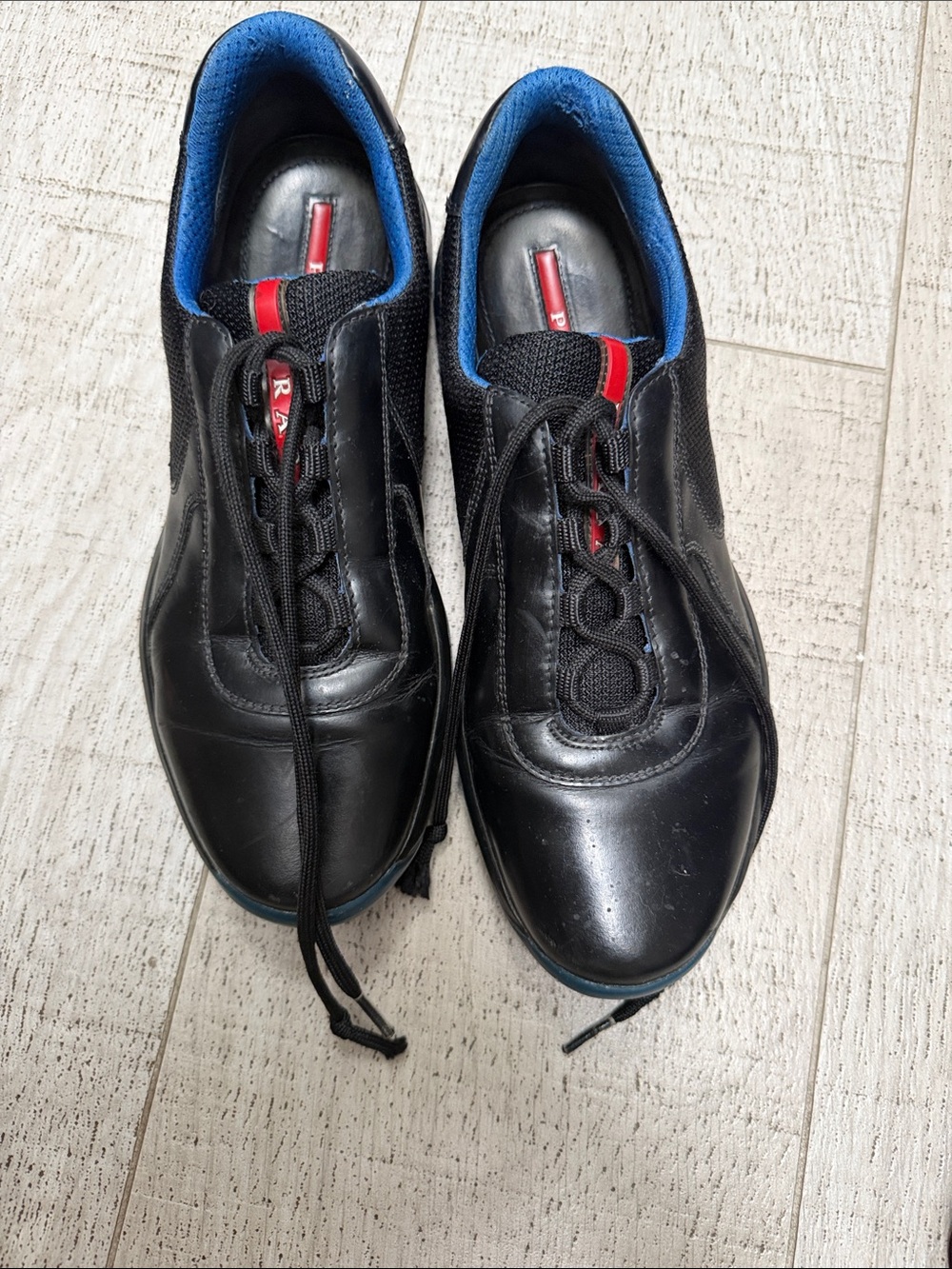 Prada Black Leather Sneakers with Blue and Red Accents